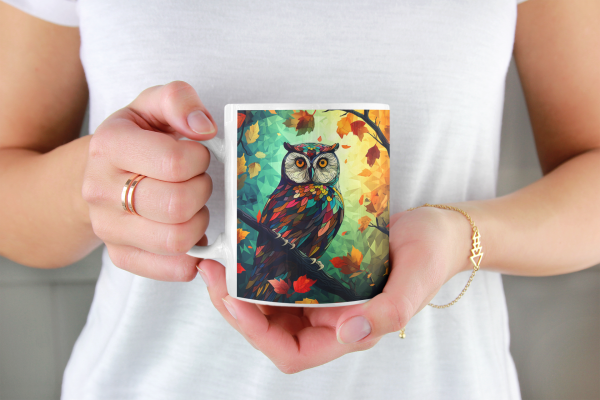 Welcome to our stunning forest collection of coffee mugs! This 11oz coffee mug features a colorful owl perched on a tree branch in a peaceful forest setting, making it the perfect addition to any nature lover's collection. Our mugs are made with high-quality ceramic materials that are both durable and dishwasher safe, ensuring that your owl mug will last for years to come. The vivid colors of the design are sure to stand out, making it a great conversation starter with friends and family over a hot cup of coffee or tea. This owl mug is just one of the many designs we offer in our forest collection, which includes a variety of beautiful creatures and landscapes found in the great outdoors. Whether you're an avid hiker, birdwatcher, or simply appreciate the natural beauty of the world around us, our collection has something for everyone. Our mugs make the perfect gift for any occasion, from birthdays to holidays, and are suitable for nature lovers of all ages. And with our fast and reliable shipping, you can enjoy your new owl mug in no time! So why wait? Add this beautiful owl mug to your collection today and enjoy the serenity of the forest every time you take a sip. And don't forget to check out our other forest-themed products to complete your collection! Warm-up with a nice cuppa out of this customized ceramic coffee mug. Personalize it with cool designs, photos or logos to make that "aaahhh!" moment even better. It’s BPA and Lead-free, microwave & dishwasher-safe, and made of white, durable ceramic in 11-ounce size. Thanks to the advanced printing tech, your designs come to life with incredibly vivid colors – the perfect gift for coffee, tea, and chocolate lovers. .: White ceramic .: 11 oz (0.33 l) .: Rounded corners .: C-handle .: Lead and BPA-free