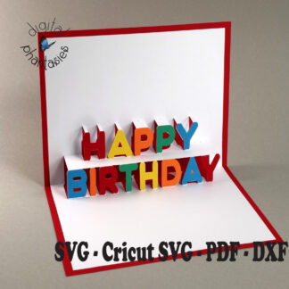 A greeting card with a red base, with a white insert that has the words Happy Birthday that pop up. Birthday is on the bottom and Happy is centered above it. Individual letters spelling Happy Birthday are glued to the white insert of the card.